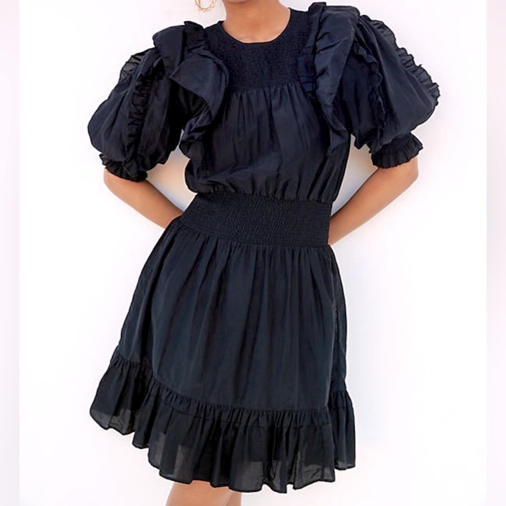 Magali Pascal black mini dress in xs.  Statement sleeve.